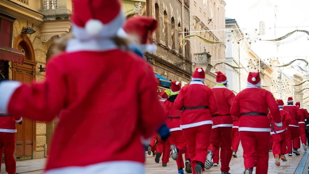 running santas through street